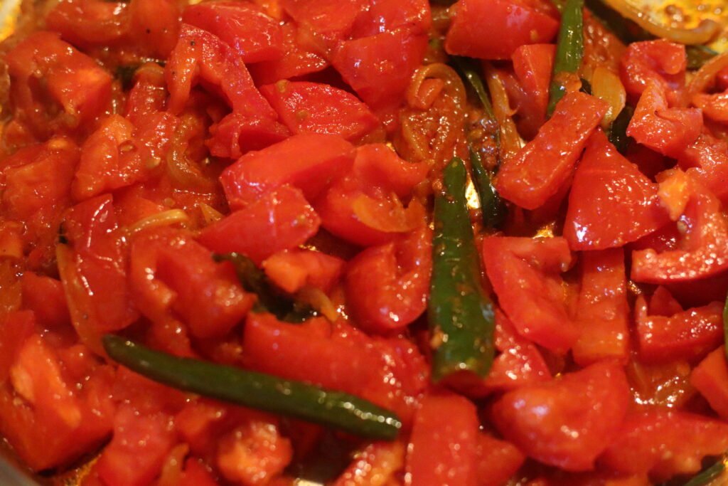 Add the chopped tomatoes.