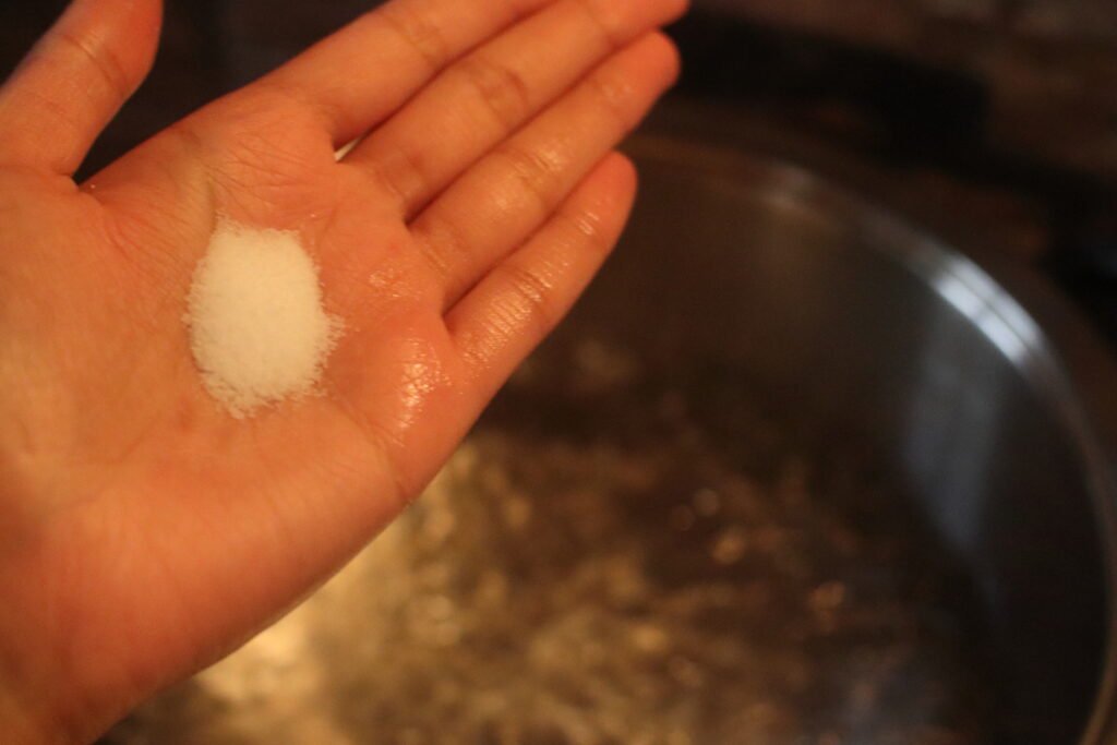 Add salt to boiling water