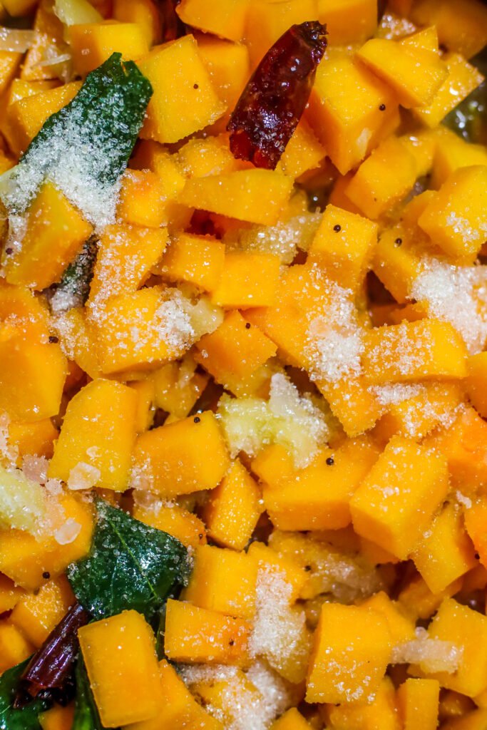 Braised butternut with salt and sugar cooking with lid on low heat