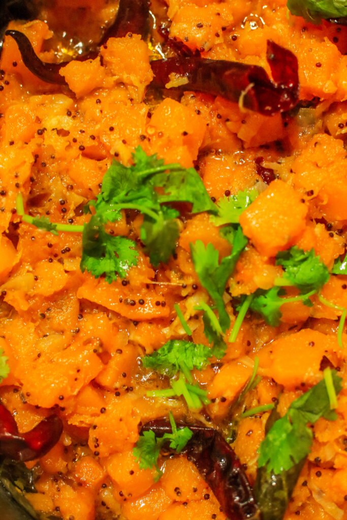 Finished Indian braised butternut garnished with fresh coriander ready to serve