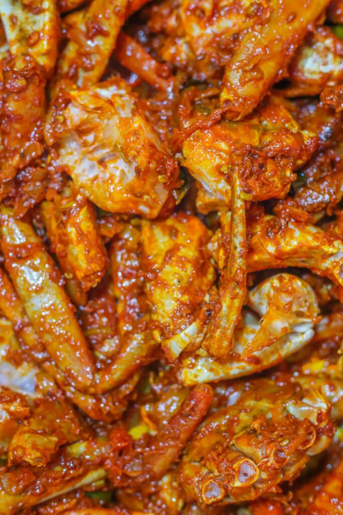 fresh crab pieces coated in spice mixture for authentic durban crab curry recipe