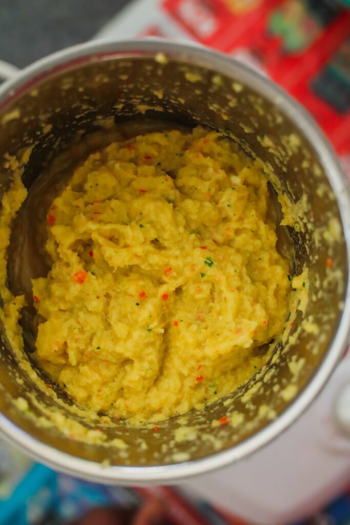 ginger, garlic, chillies and curry leaves being blended in a food processor