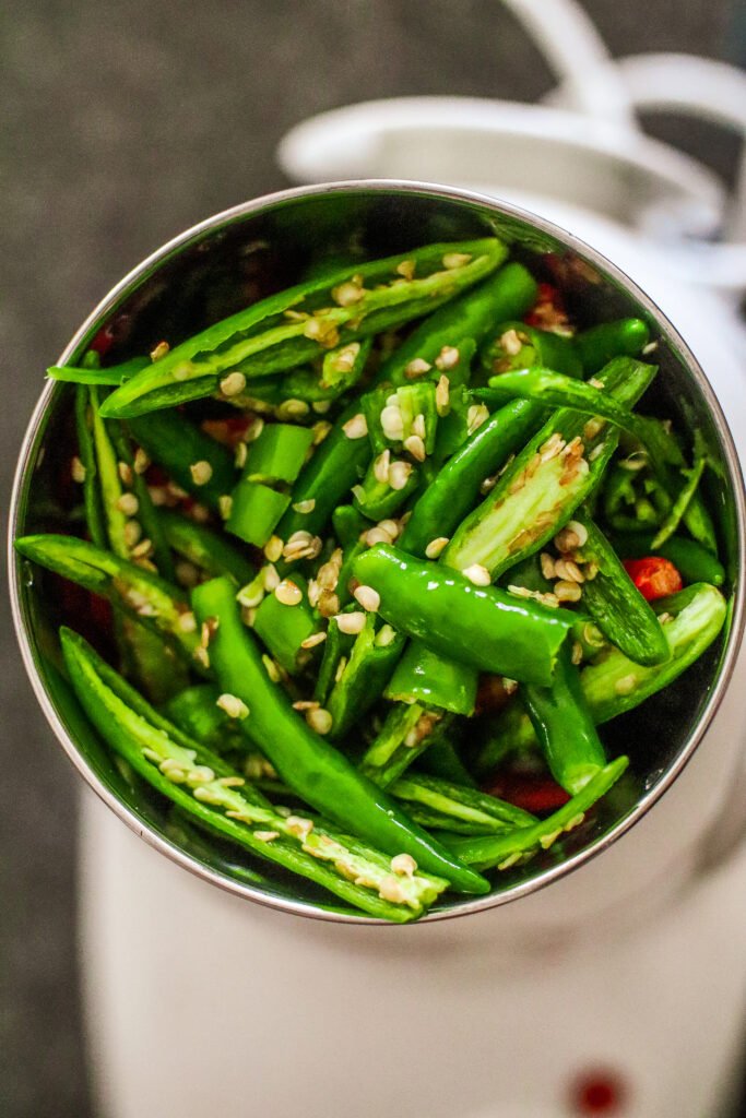 fresh green and red chillies in a blender
