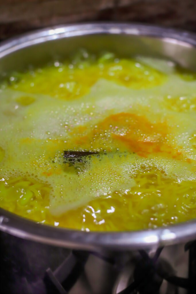 cooking turmeric basmati rice for green mutton biryani