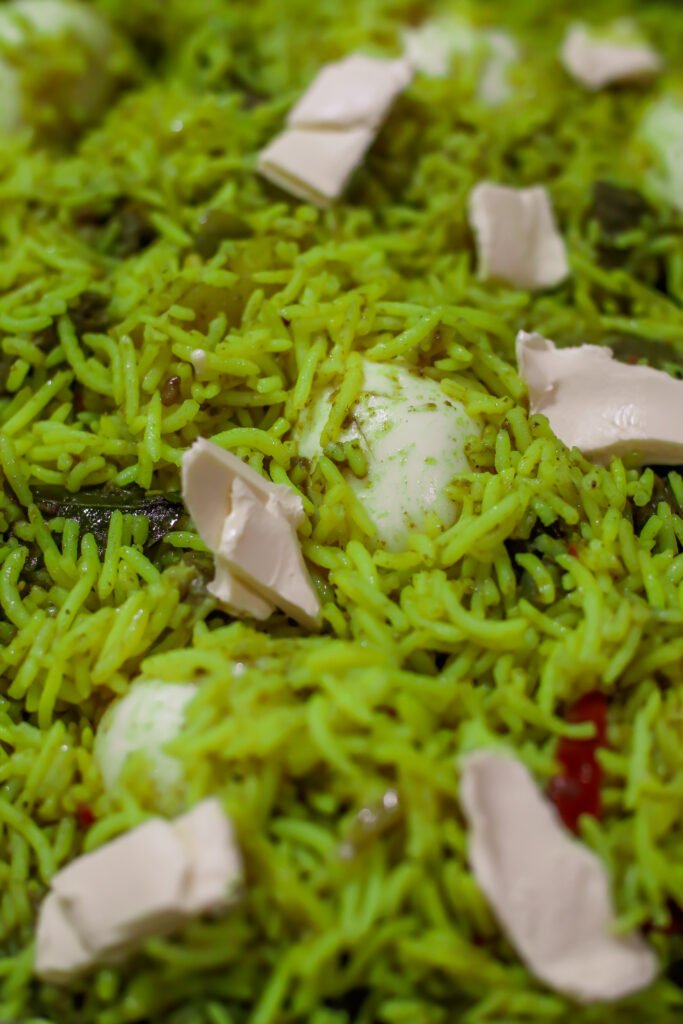 Place margarine on top of rice before steaming biryani